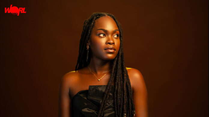 For Sabrina Francis, music has never been just a career. It has been a language, a journal, a source of healing and a way to make sense of the world around her. Growing up as the seventh of nine children in Madeys, St. Patrick’s, Grenada, Sabrina was surrounded by music from an early age. With her mother, calypsonian Lady Empress, and her father’s love of vocals and guitar, music was woven into family life. Although she once imagined a future in accounting or the corporate world, her journey would take her somewhere far more personal: a life dedicated to storytelling, cultural expression and connecting with people through song. Today, Sabrina Francis stands at an exciting point in her career. In 2026, she made history as Grenada’s first female Groovy Soca Monarch, winning with her song Honour You and introducing her music to a new audience. Yet, for Sabrina, the victory represents more than a crown. It is another reminder of what is possible when you trust your abilities, remain true to yourself and embrace opportunities to grow. Her music, which she describes as Afro-Caribbean Pop, continues to draw inspiration from Grenadian culture, Caribbean experiences and the emotions that connect us as human beings. Through projects such as Meet Me at the Mango Tree, she is also finding new ways to honour the island’s storytelling traditions while challenging herself creatively. In this Worlmag exclusive, Sabrina opens up about her childhood, her purpose as an artist, the significance of her historic Groovy Monarch win, and what lies ahead. With a brand-new story and 14 new songs ready for the return of Meet Me at the Mango Tree, she is entering what she calls a season of experimentation — one built around taking risks, creating connections and reaching new audiences. Sabrina Francis